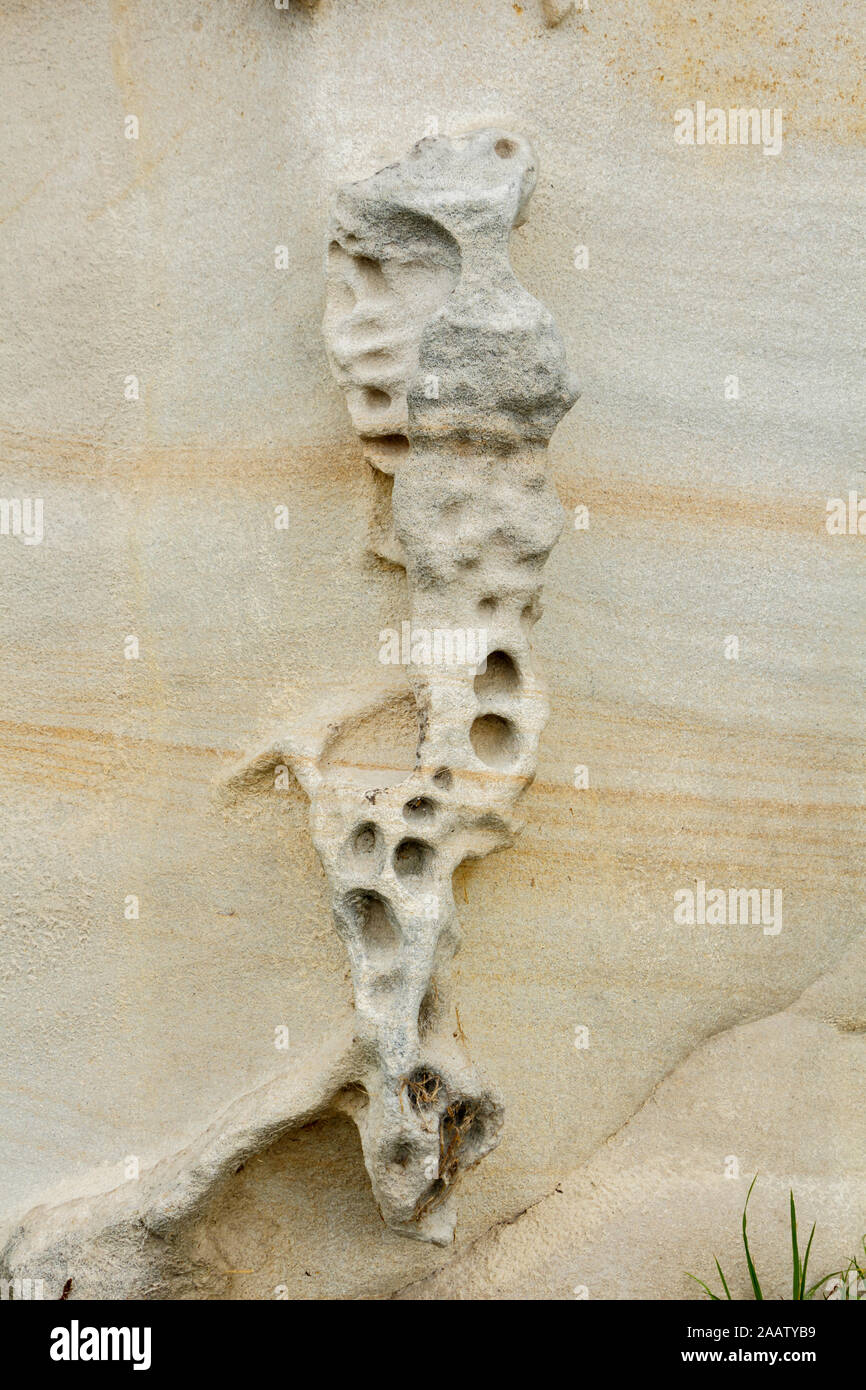 Abstract eroded weathered Beige Rock formation background Stock Photo ...