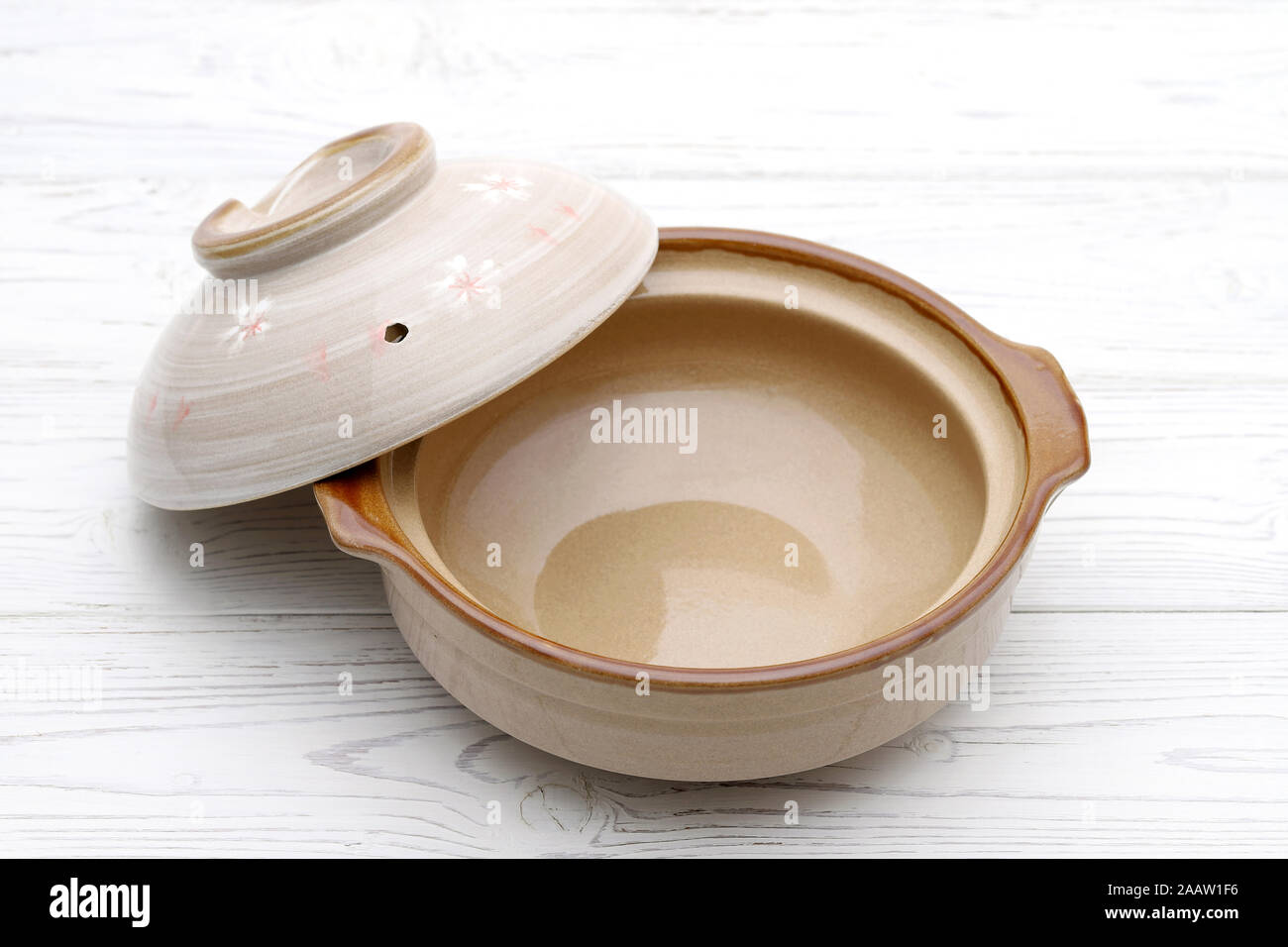 Japanese donabe pot made of clay, traditional cooking utensils Stock