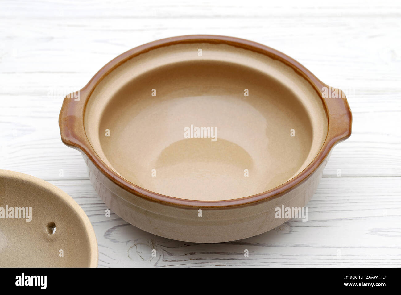 Japanese donabe pot made of clay, traditional cooking utensils Stock