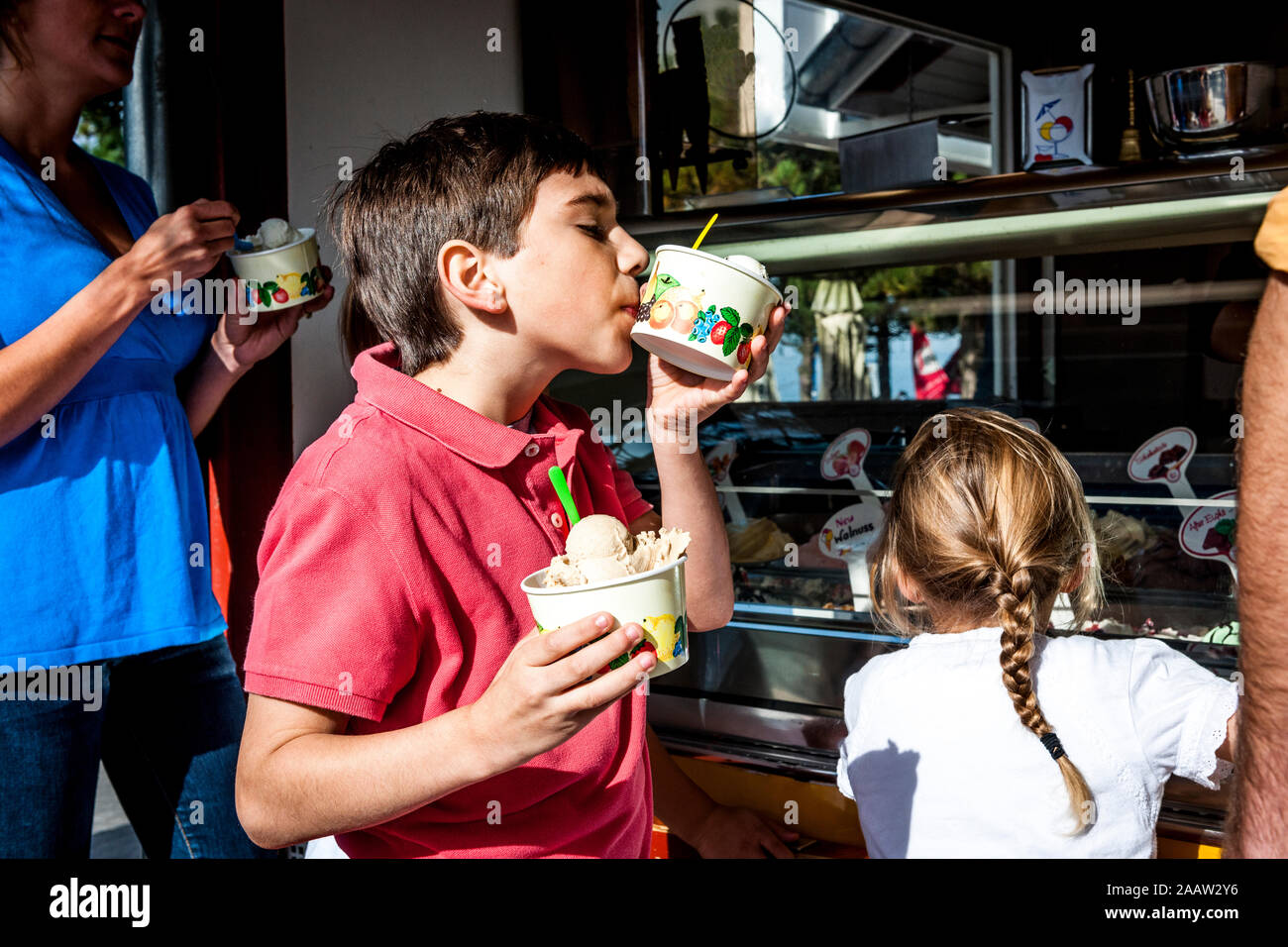 Family having ice cream at an ice cream parlor Stock Photo