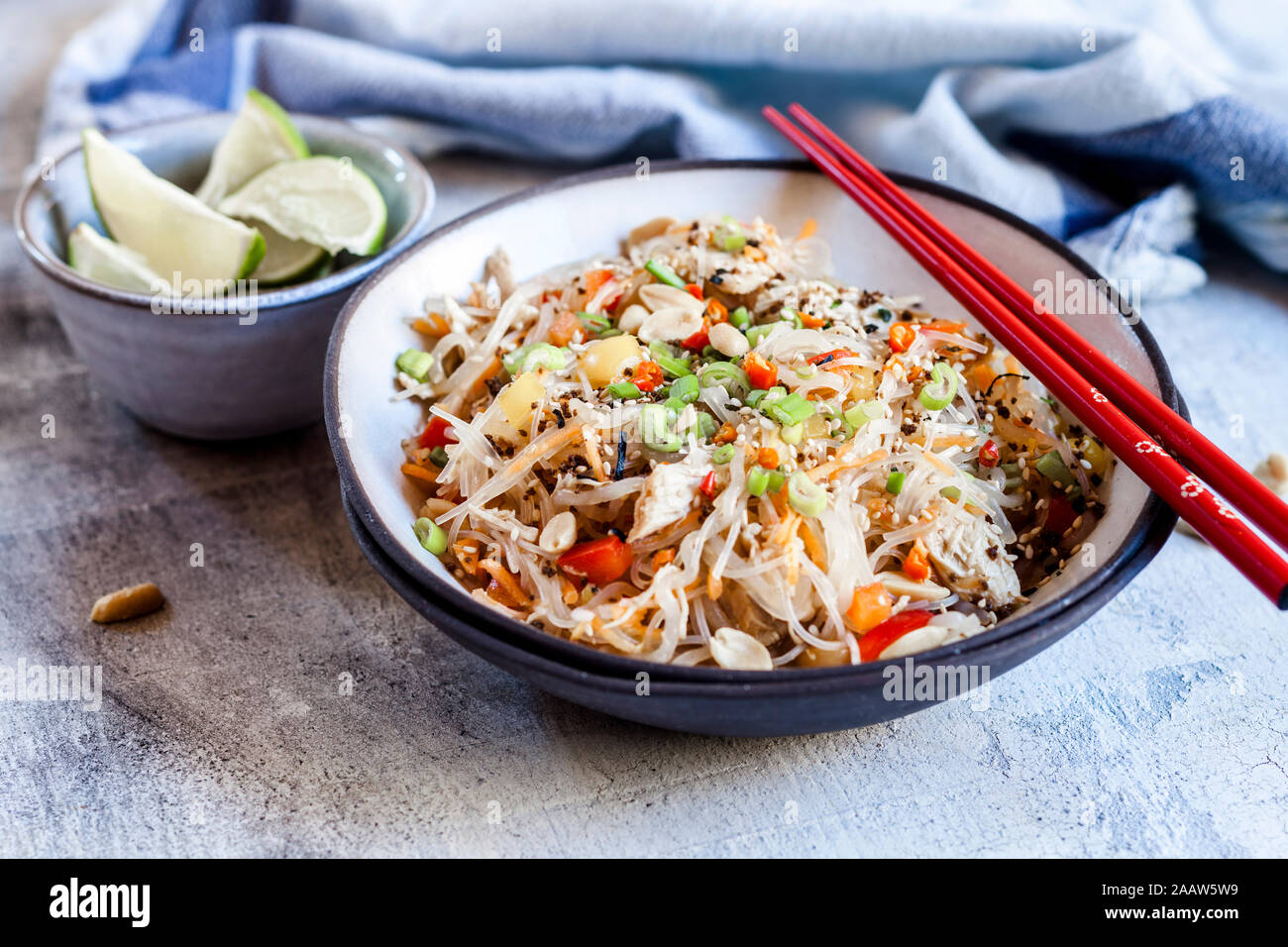 Glass noodle salad with Thai dressing, vegetables and chicken Stock Photo