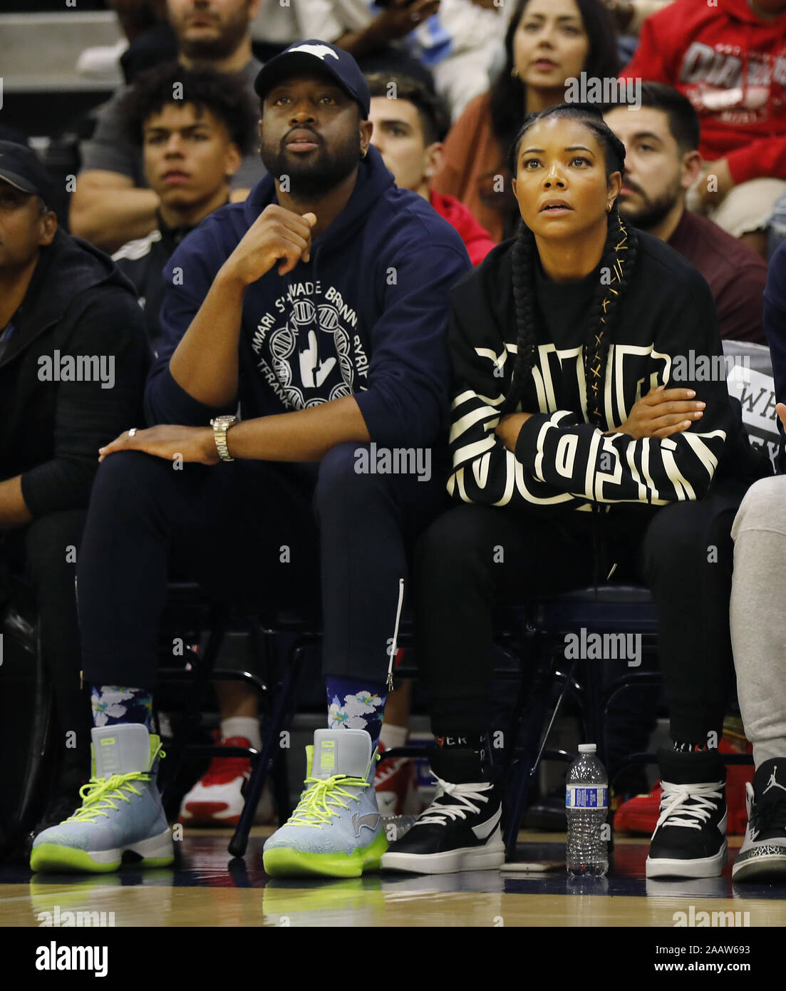 San Diego, California, USA. 23rd Nov, 2019. Retired 13-time NBA All-Star  Dwyane Wade, left, and his wife Gabrielle Union-Wade cheer on the Sierra  Canyon basketball team during a game against Cathedral Catholic.