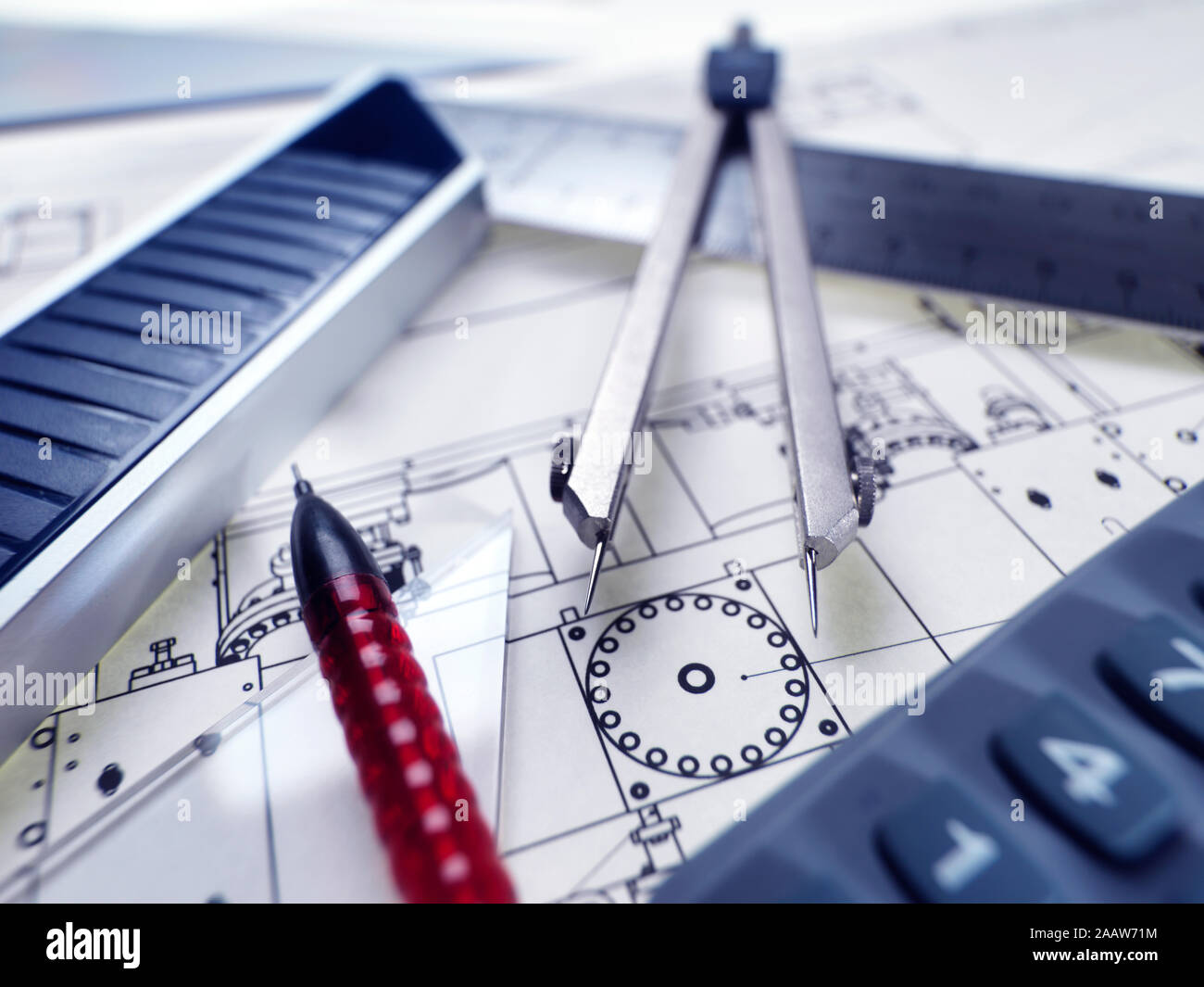 High angle close-up of drawing equipment on blueprint in office Stock Photo