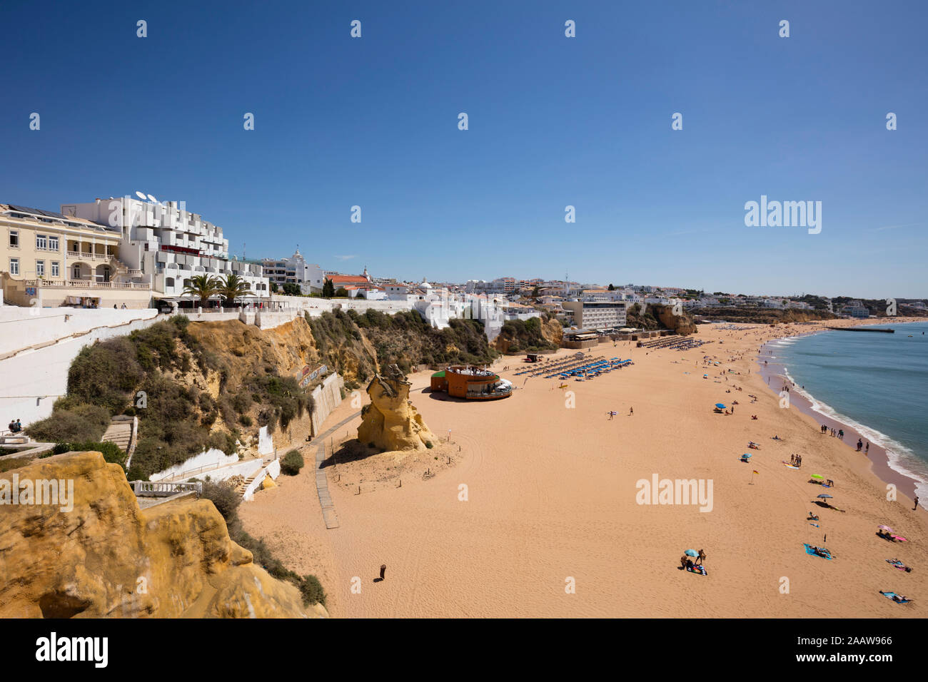 Scenic view of sandy beach against clear sky at Albufeira, Algarve, Portugal Stock Photo