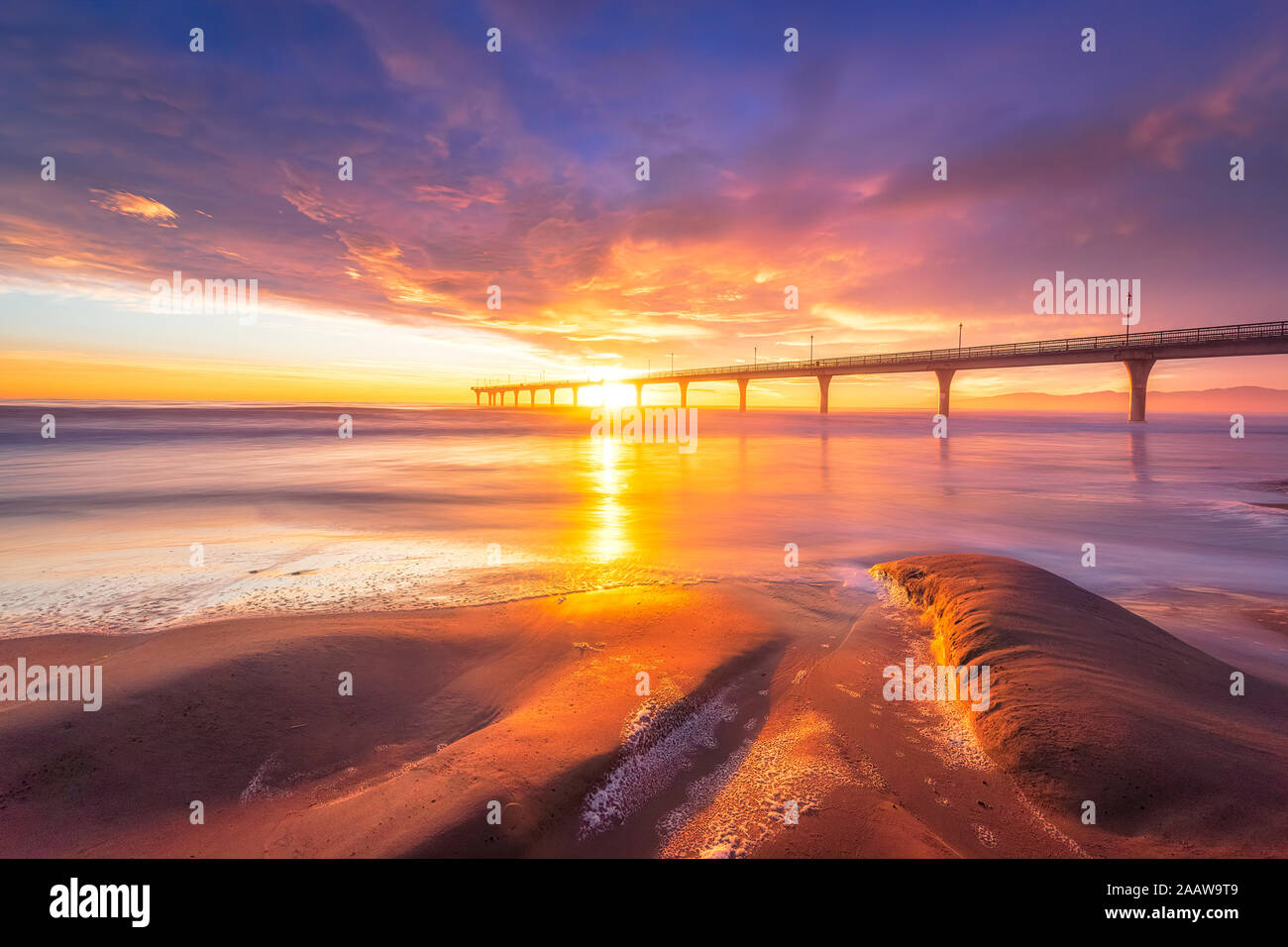 Sunrise at Brighton Pier in Christchurch, South Island, New Zealand Stock Photo
