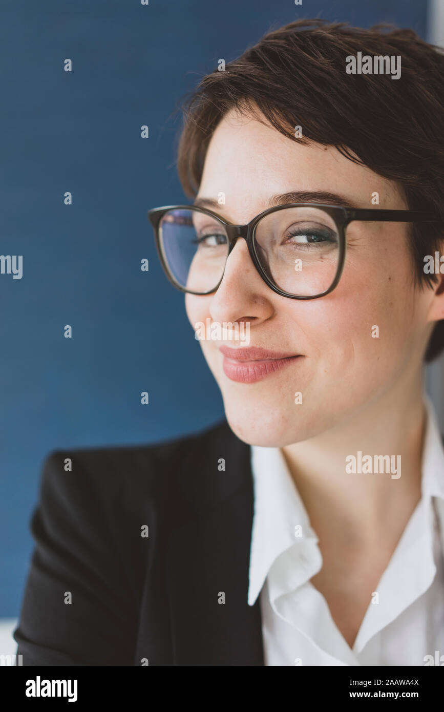 Portait of smiling young businesswoman Stock Photo