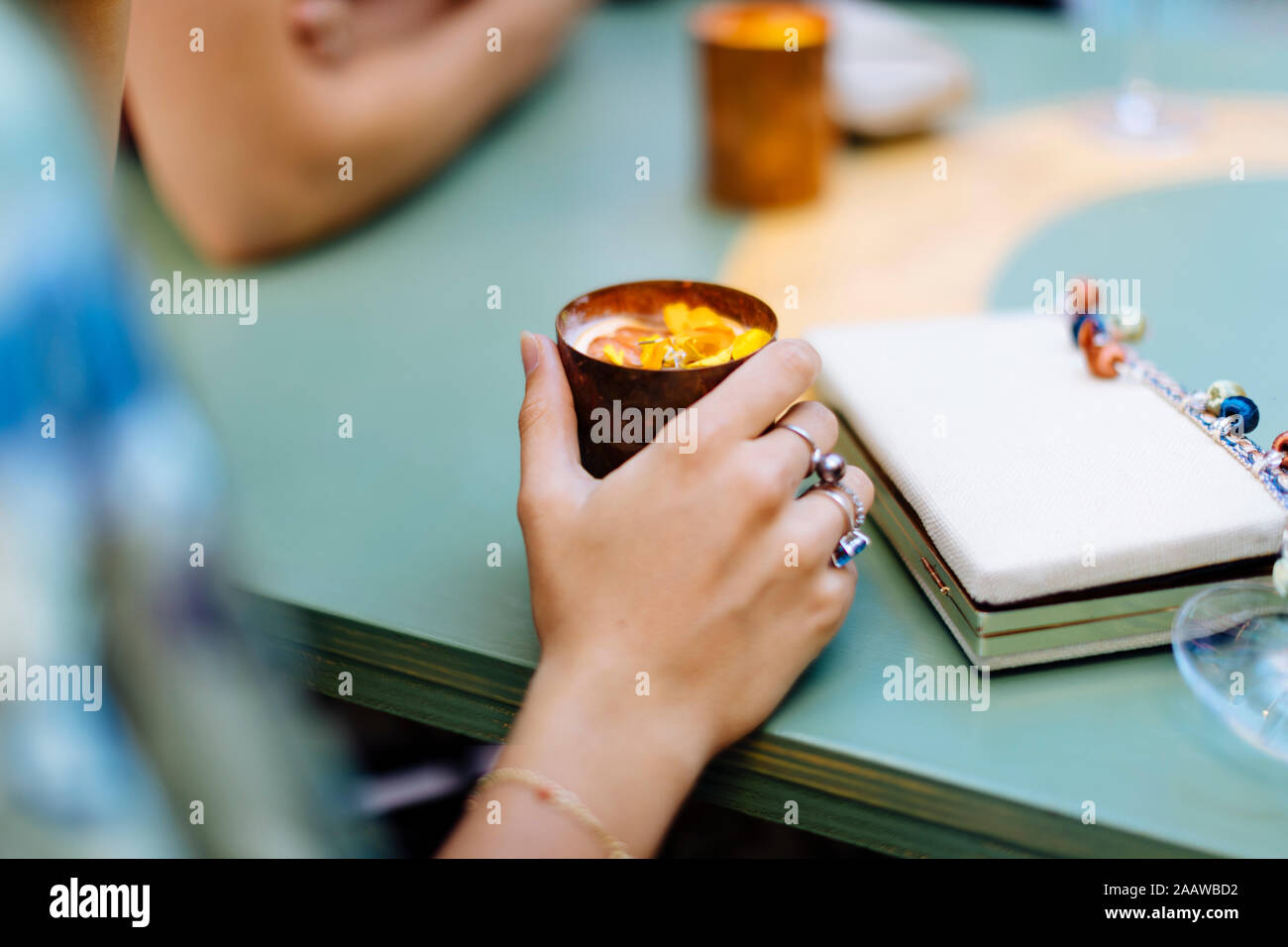 Hand holding glass Stock Photo