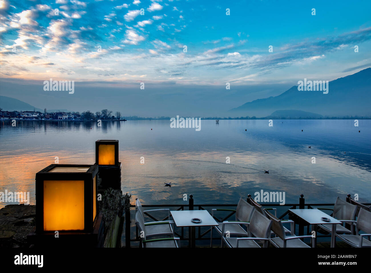 View to lake Pamvotis in a foggy day at sunset, Greece Stock Photo