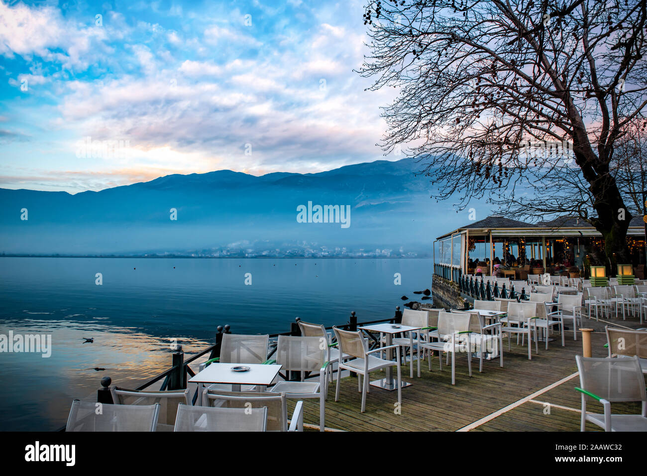 Perfect view to the lake Pamvotis at foggy day, Greece. Stock Photo