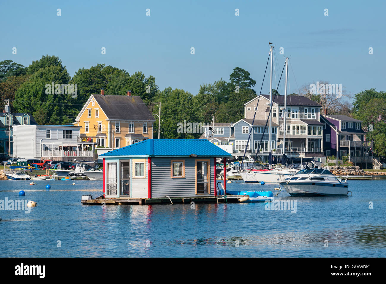 Canada, Nova Scotia, Lunenburg County, Mahone Bay, houseboat in bay Stock Photo