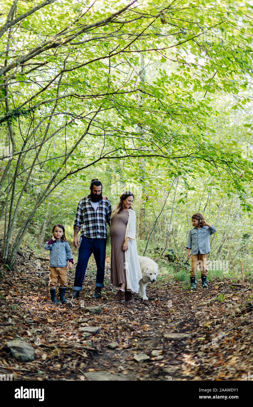 Family with two kids and dog hi-res stock photography and images - Alamy