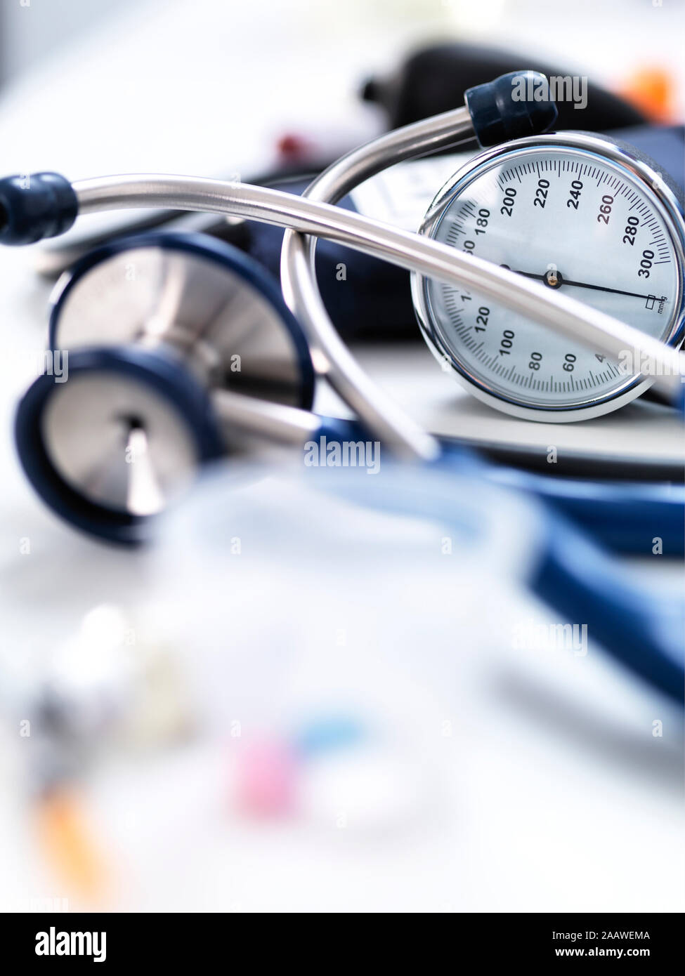 Close-up of sphygmomanometer and stethoscope on table in laboratory Stock Photo