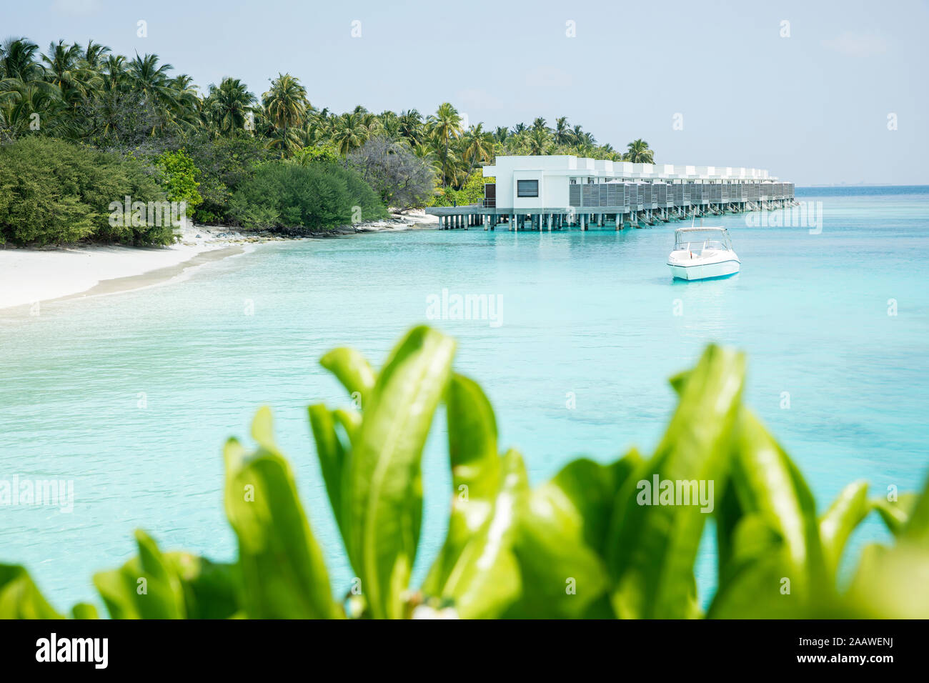 View of tourist resort over sea against sky at Maldives Stock Photo