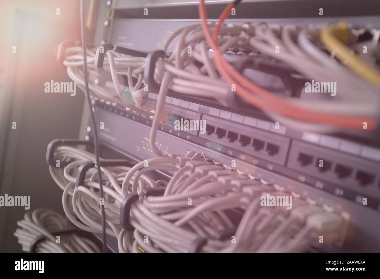 Server rack with Servers and cables Stock Photo