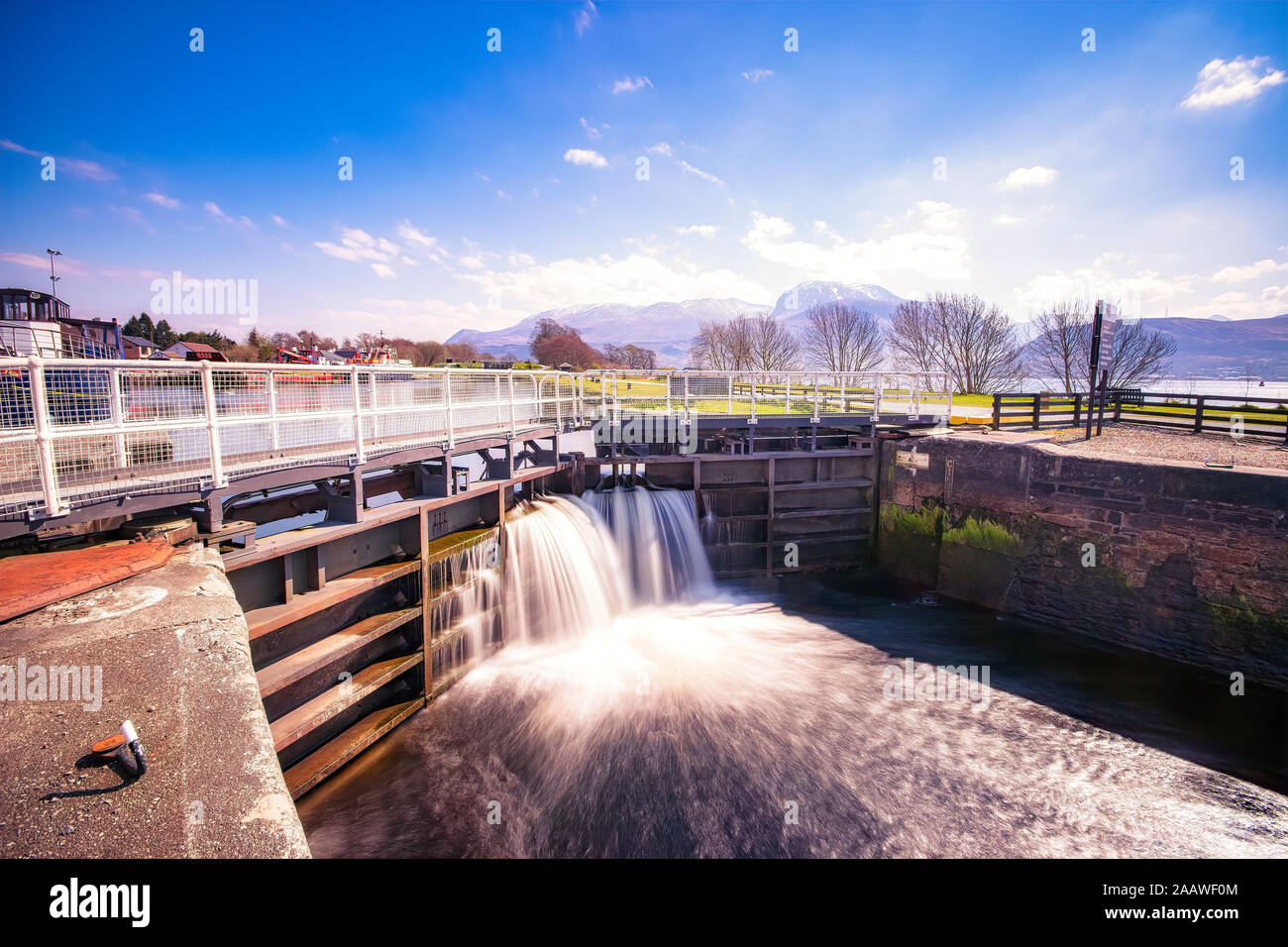 Lock gates at Caledonian Canal with Ben Nevis in background, Highlands, Scotland, UK Stock Photo