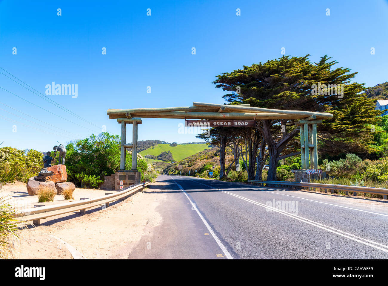 Built structure at start point of Great Ocean Road against clear blue sky, Victoria, Australia Stock Photo