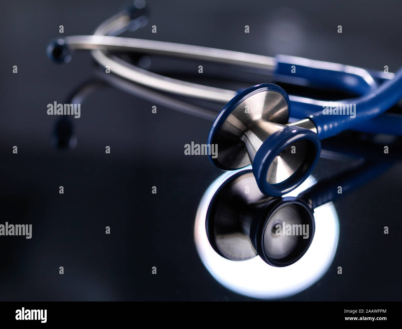 Close-up of stethoscope on table in hospital Stock Photo