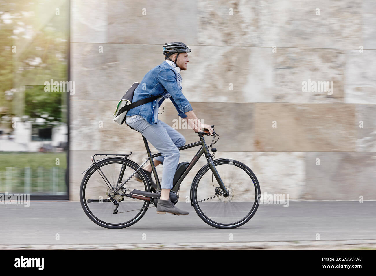 Student on his e-bike at Goethe University in Frankfurt, Germany Stock Photo