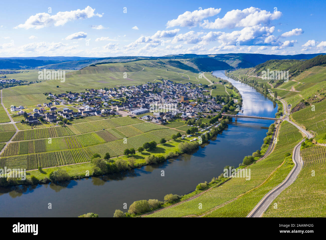 Drone shot of Mosel River amidst land, Trittenheim, Germany Stock Photo