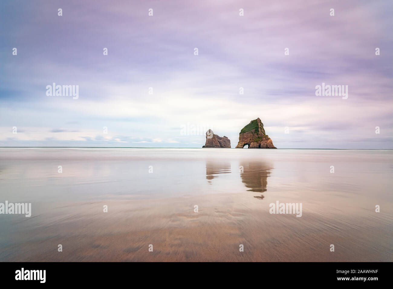New Zealand, South Island, Wharariki Beach, Archway Islands, rock formations in sea Stock Photo