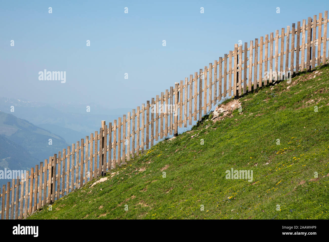 Wooden fence on Kitzbüheler Horn against clear sky, Kitzbühel, Tyrol, Austria Stock Photo
