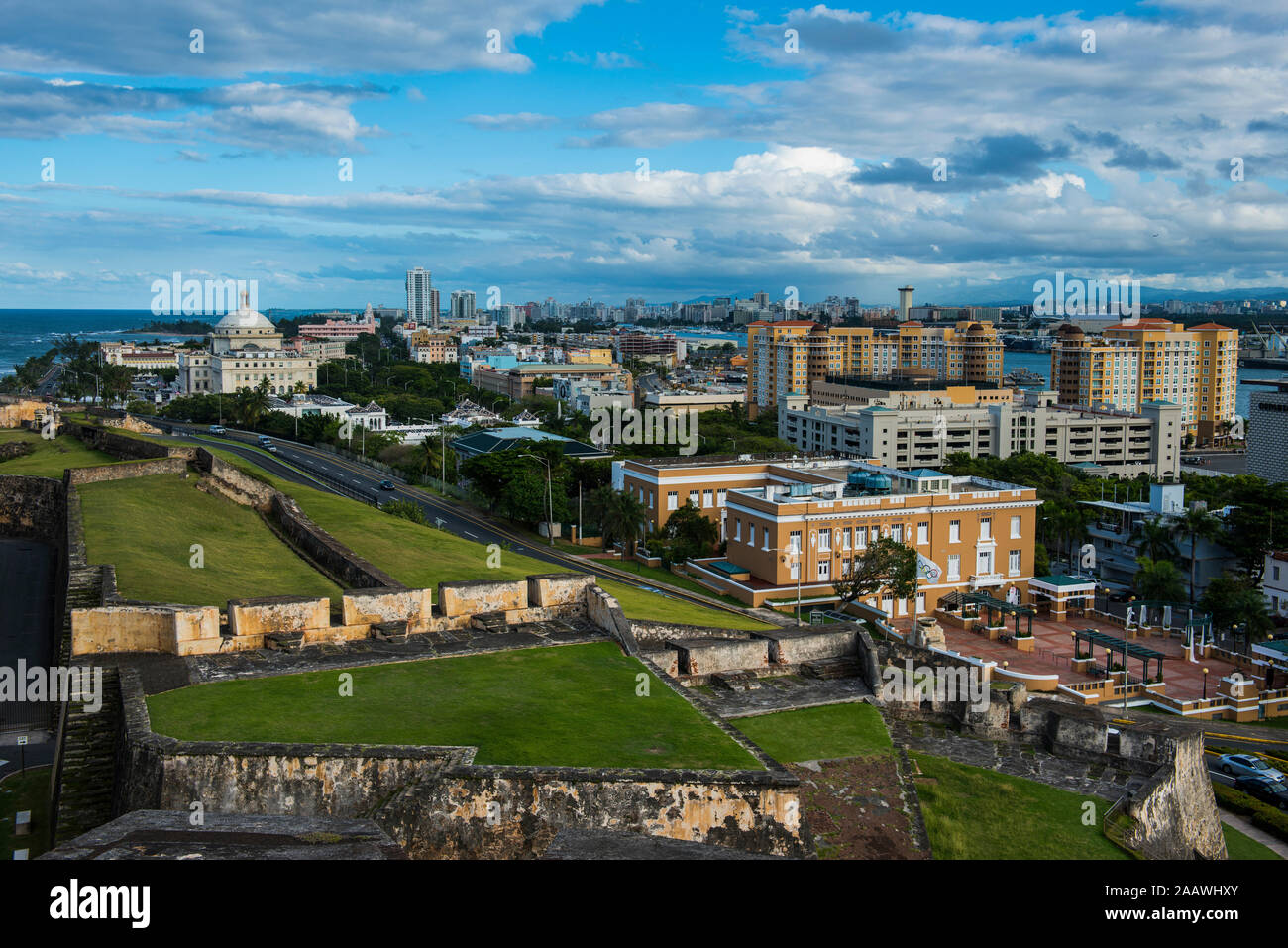 Aerial view of buildings against cloudy sky in city, Puerto Rico, Caribbean Stock Photo