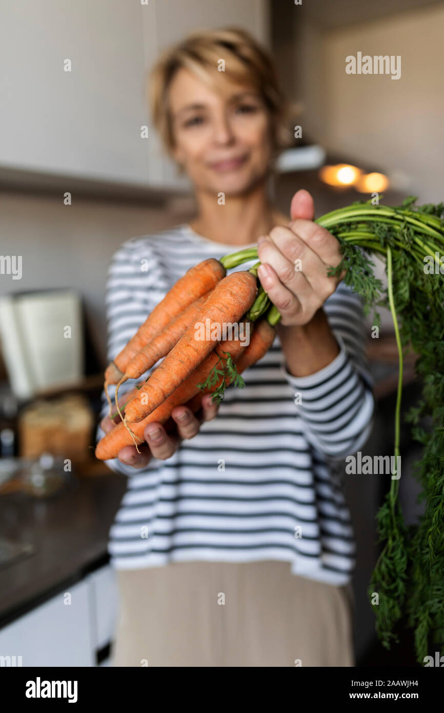 Portrait of mature woman at home Stock Photo
