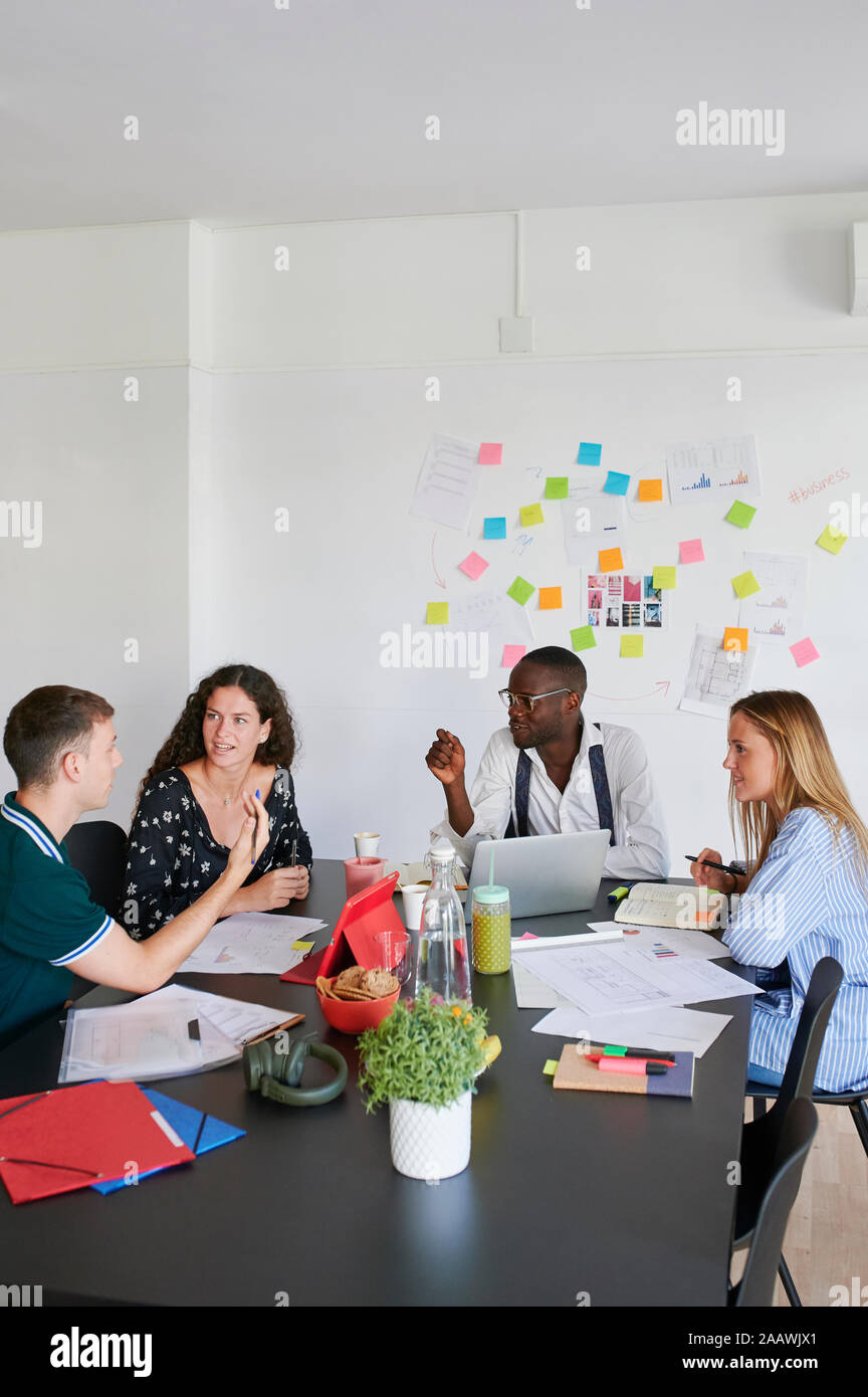 Young business people having a meeting in a modern office Stock Photo