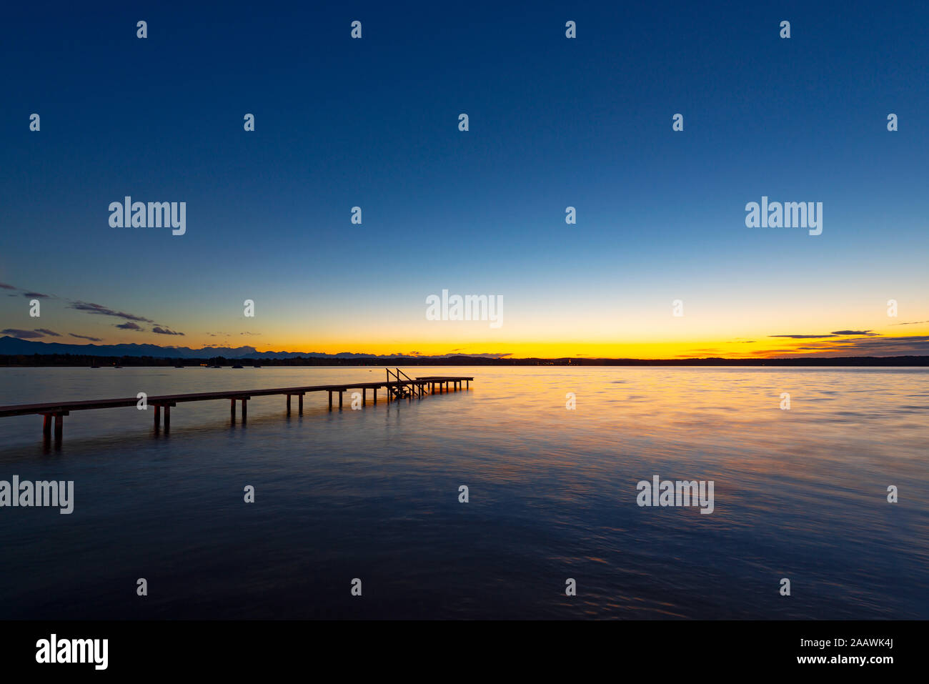 Scenic view of lake at Starnberger See during sunset, Germany Stock Photo