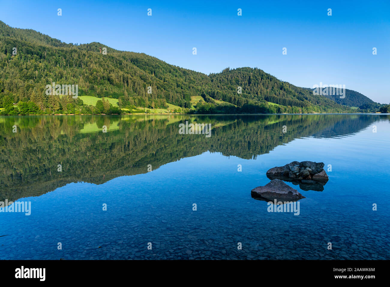 Scenic view of Schliersee lake against clear blue sky, Mangfallgebirge, Germany Stock Photo