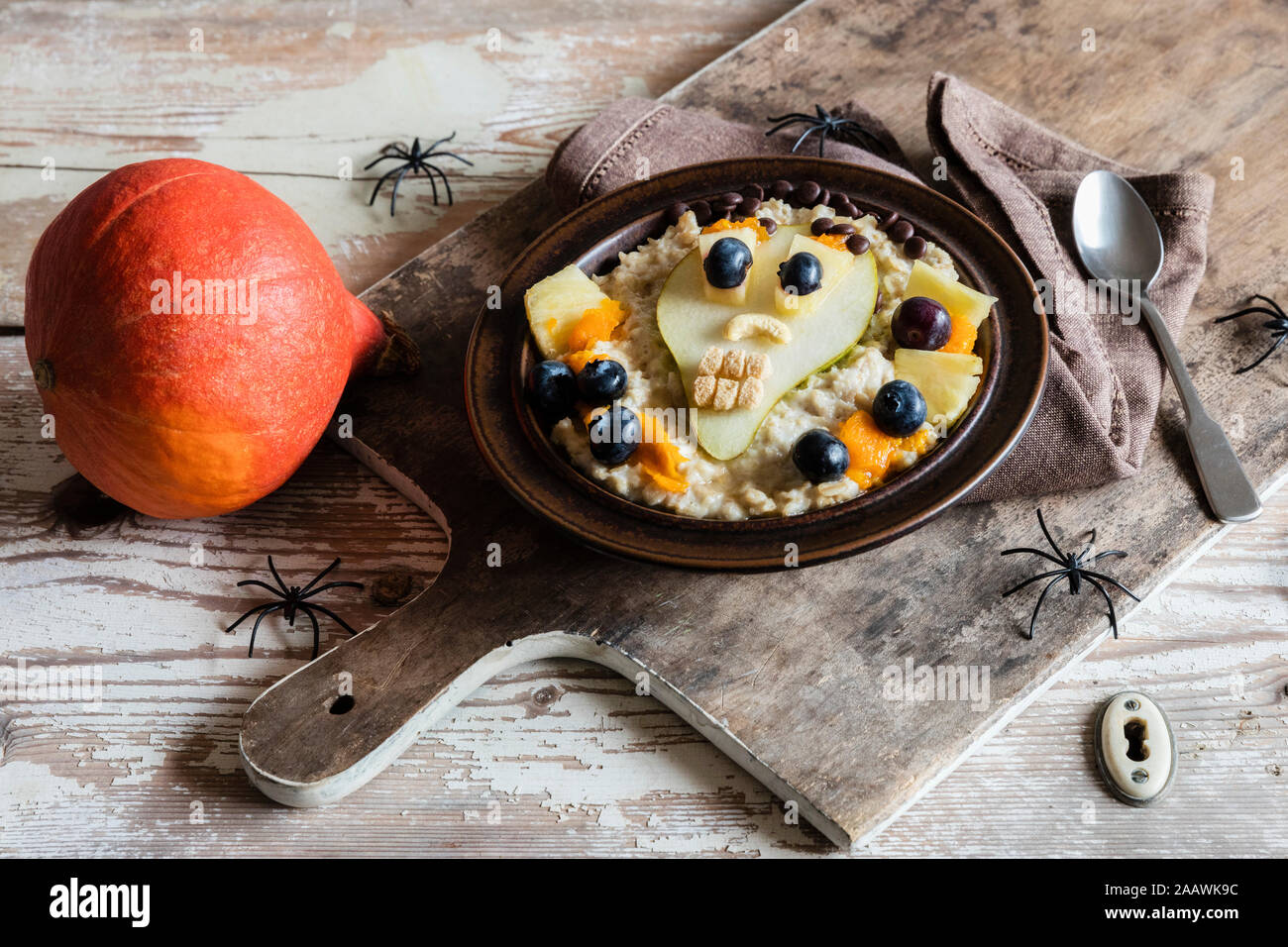 High angle view of decorated breakfast with pumpkin on table during Halloween Stock Photo