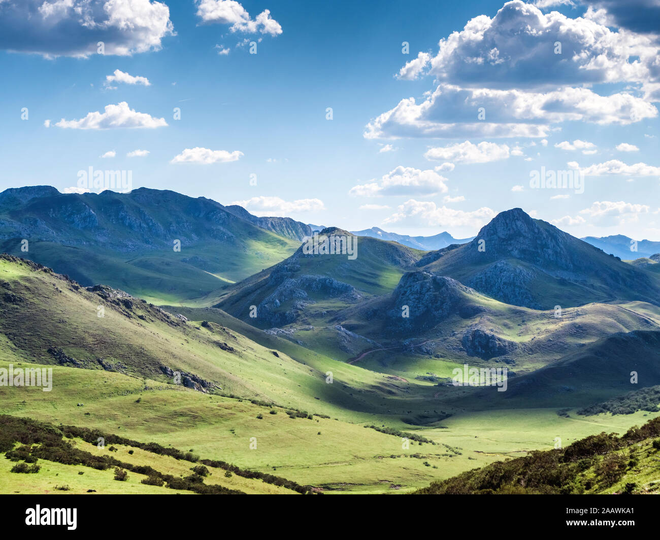 Scenic view of landscape against sky during sunny day, Asturias, Spain Stock Photo