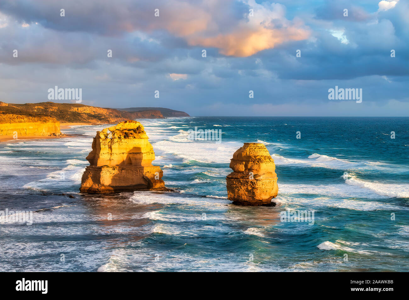 Stack rocks in sea cloudy sky at Gibsons Steps, Victoria, Australia Stock Photo