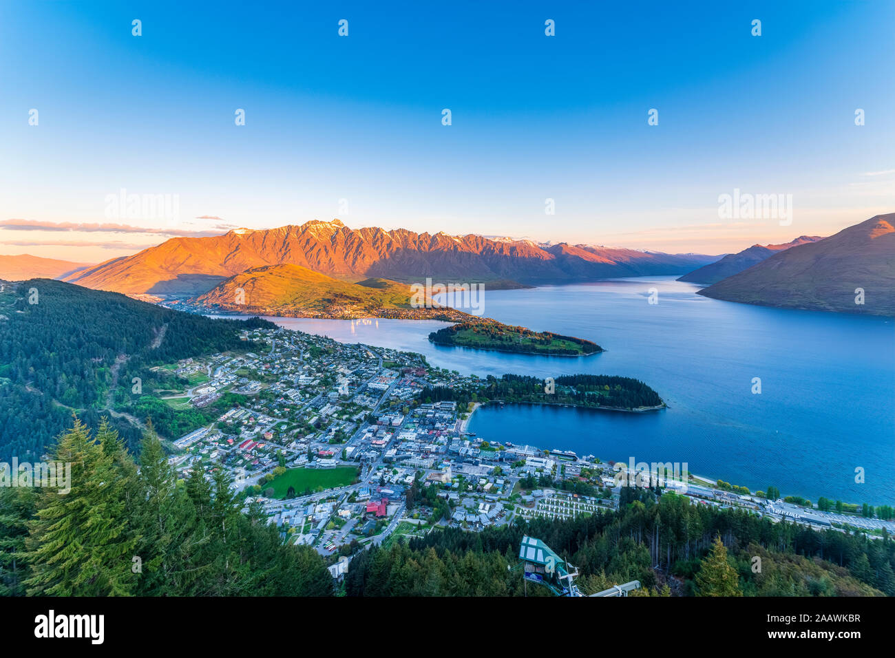 View of town from mountain against sky at Queenstown, South Island, New Zealand Stock Photo