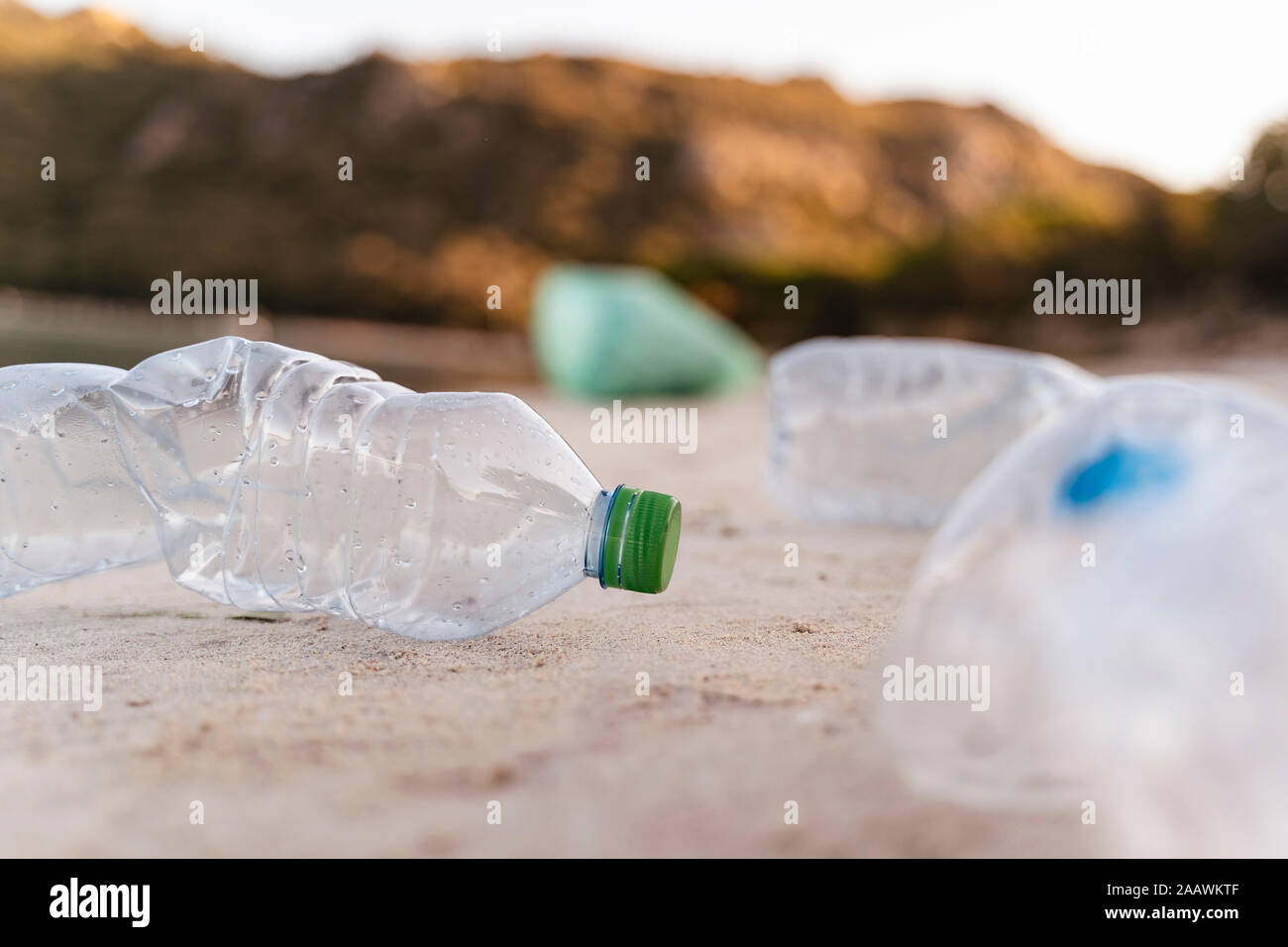 Empty plastic bottles on the beach Stock Photo