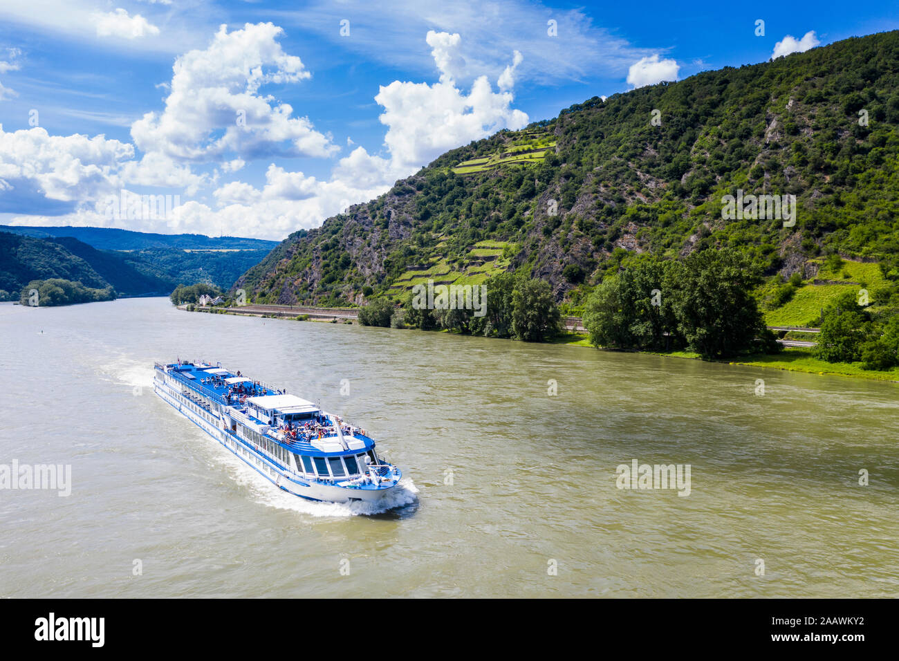 Aerial view of cruise ship on Rhine river by mountain at Boppard, Germany Stock Photo