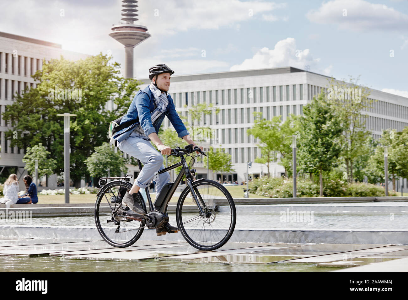 Student on his e-bike at Goethe University in Frankfurt, Germany Stock Photo