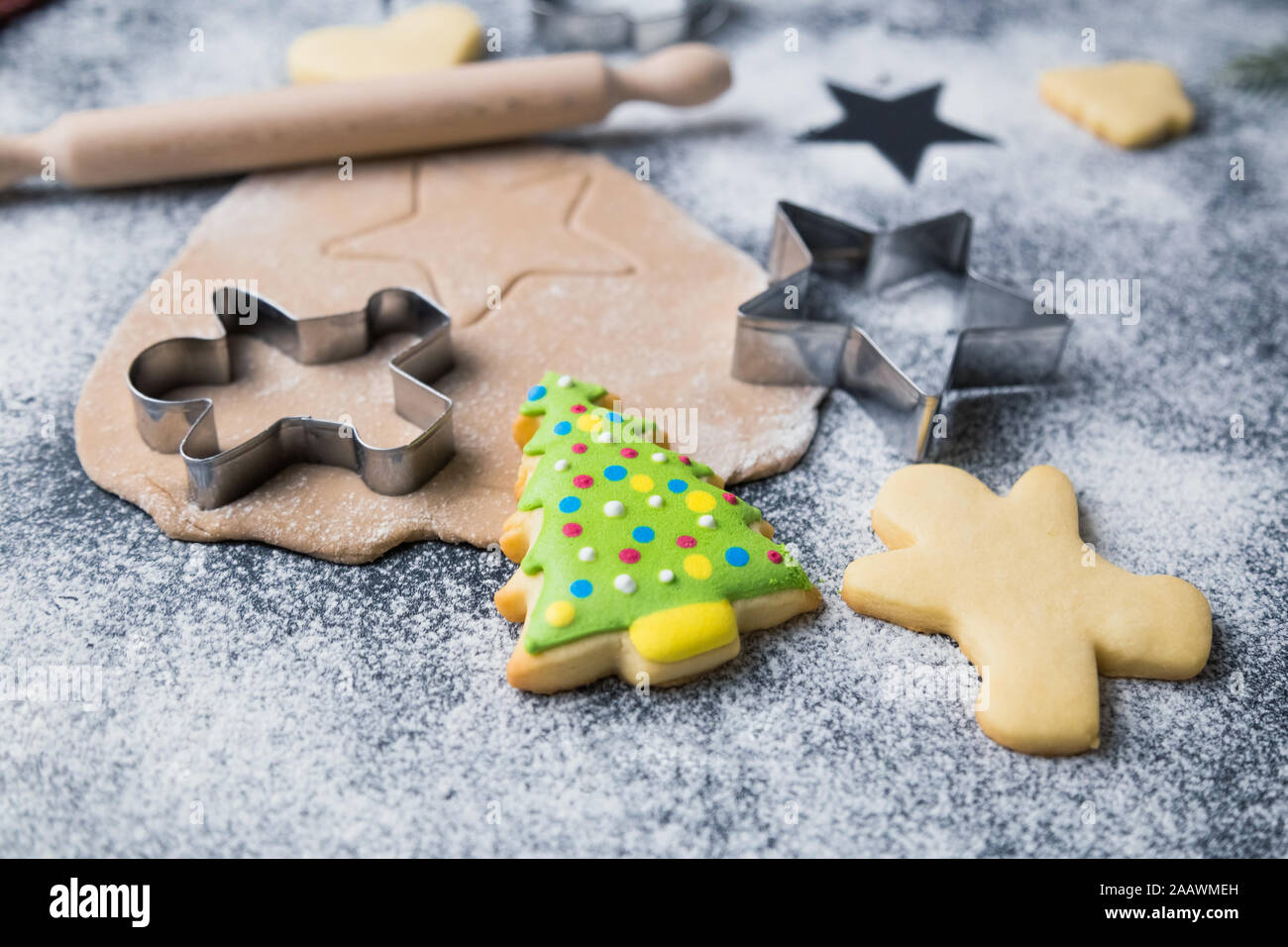 Making Christmas Cookies Concept Made Of Sugar Cutters Dough Rolling Pin And Biscuit With Colorful Icing On Table Stock Photo Alamy
