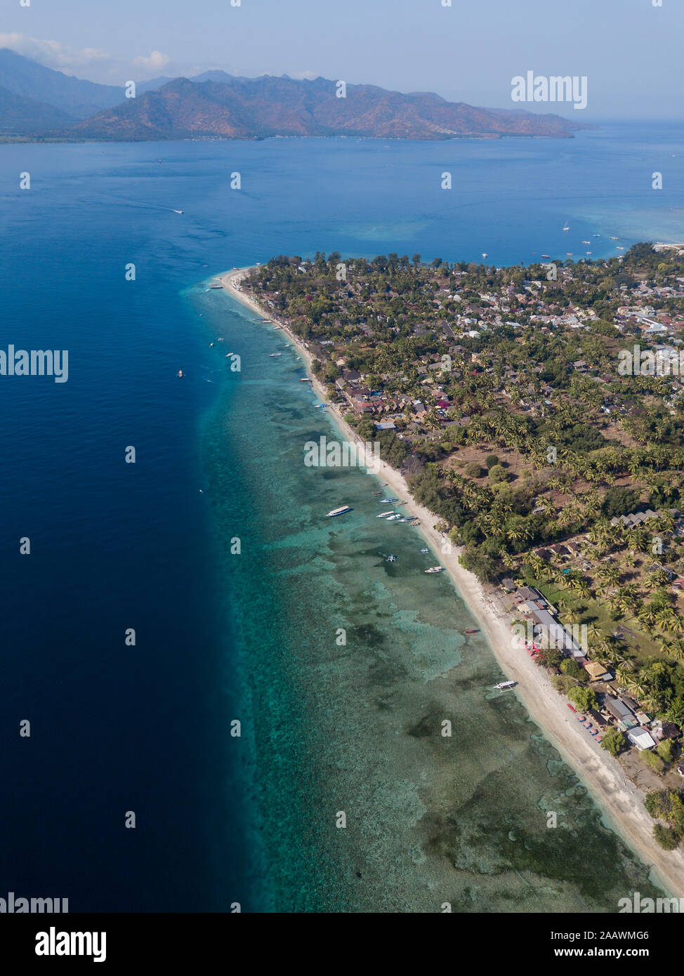 Aerial view of GiliAir Island with Lombok Island in background at Bali