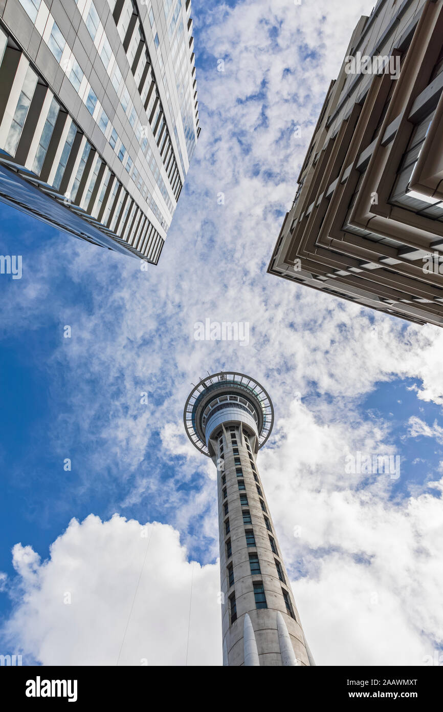 Low angle view of Sky Tower against cloudy sky in Auckland, New Zealand Stock Photo