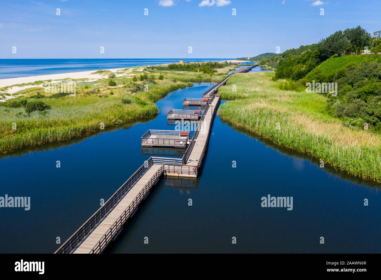 Aerial view of boardwalk amidst lake on coast of Yantarny, Kaliningrad, Russia Stock Photo