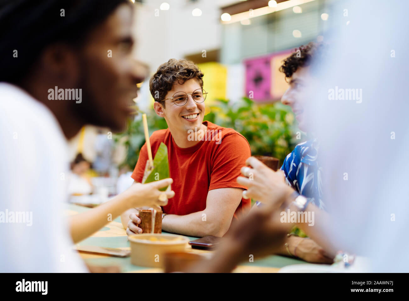 Friends talking during a party Stock Photo