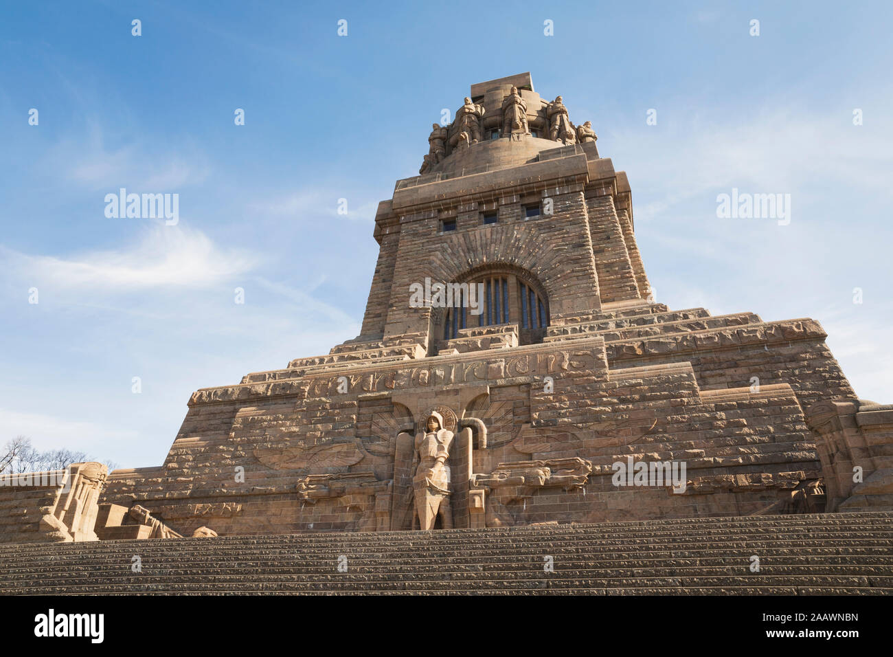 Low angle view of Völkerschlachtdenkmal against sky in Leipzig during sunny day, Saxony, Germany Stock Photo