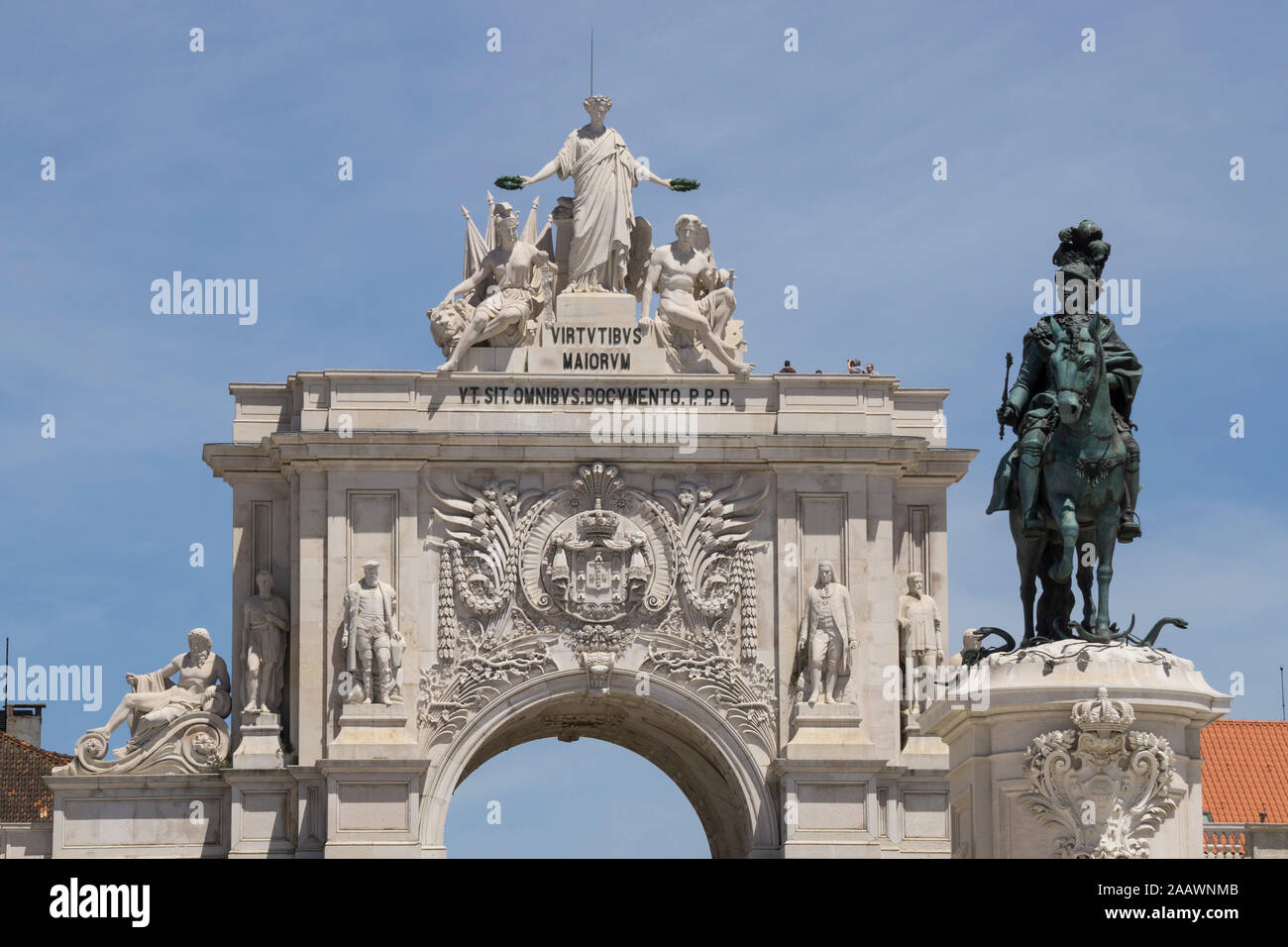 Low angle view of statue and triumphal arch in Lisbon, Portugal Stock Photo