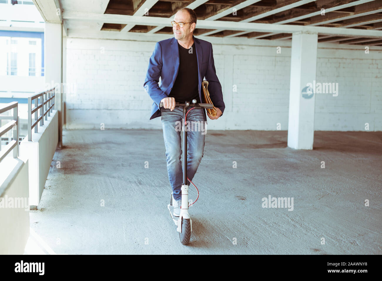 Man riding e scooter germany hi-res stock photography and images - Alamy