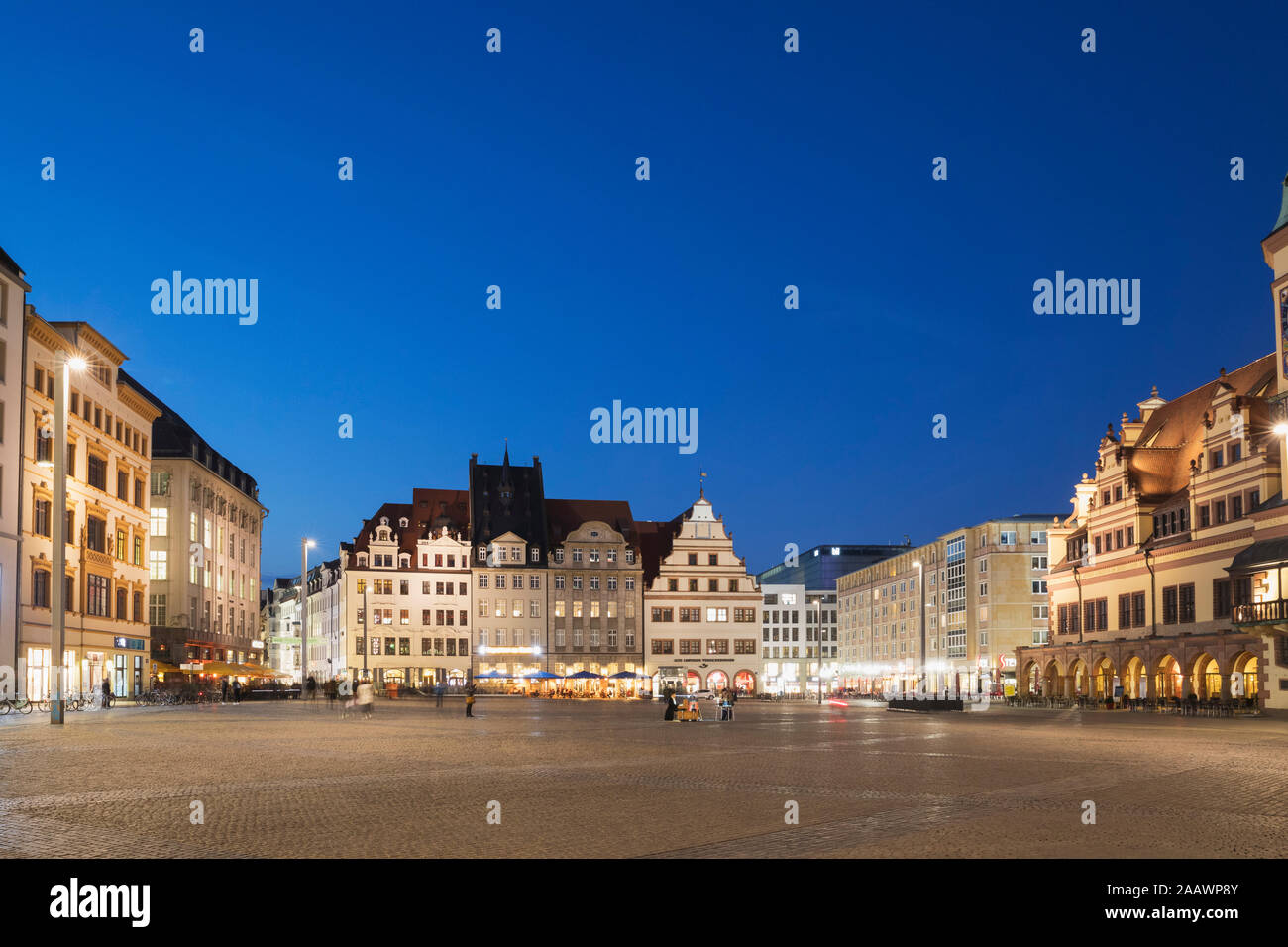 Town square amidst buildings against clear blue sky at night in Saxony, Germany Stock Photo