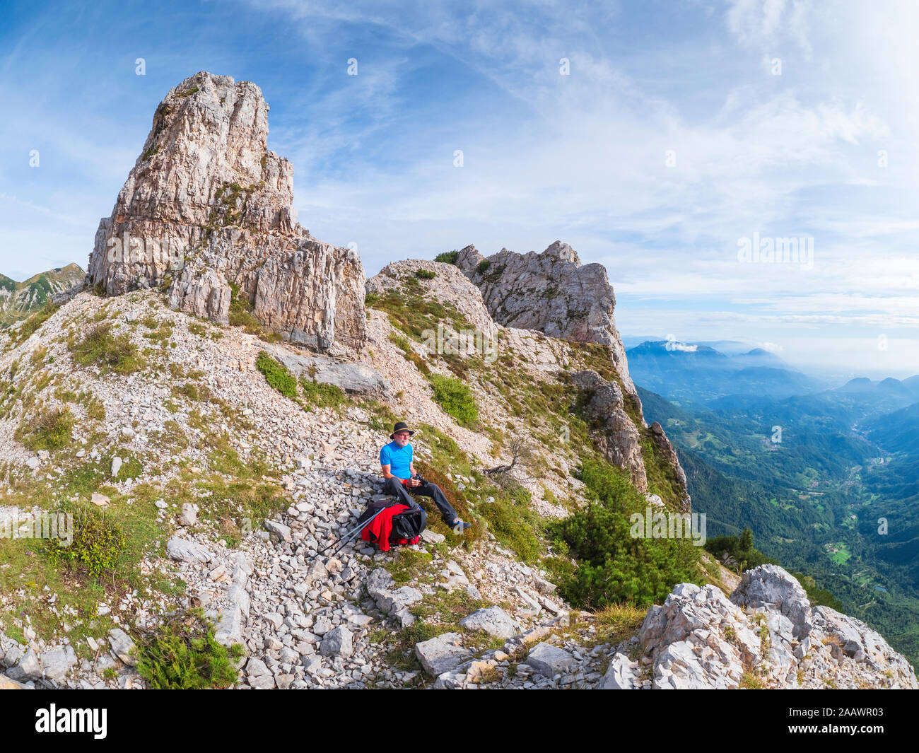 Senior hiker looking at view in he mountains, Recoaro Terme, Veneto, Italy Stock Photo