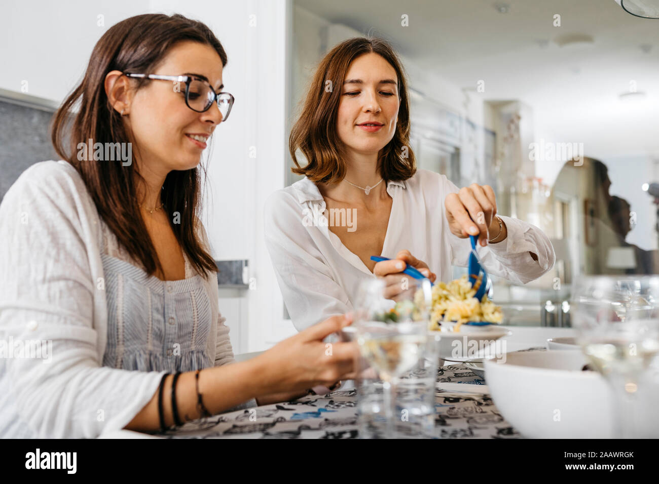 Two friends having healthy lunch together Stock Photo