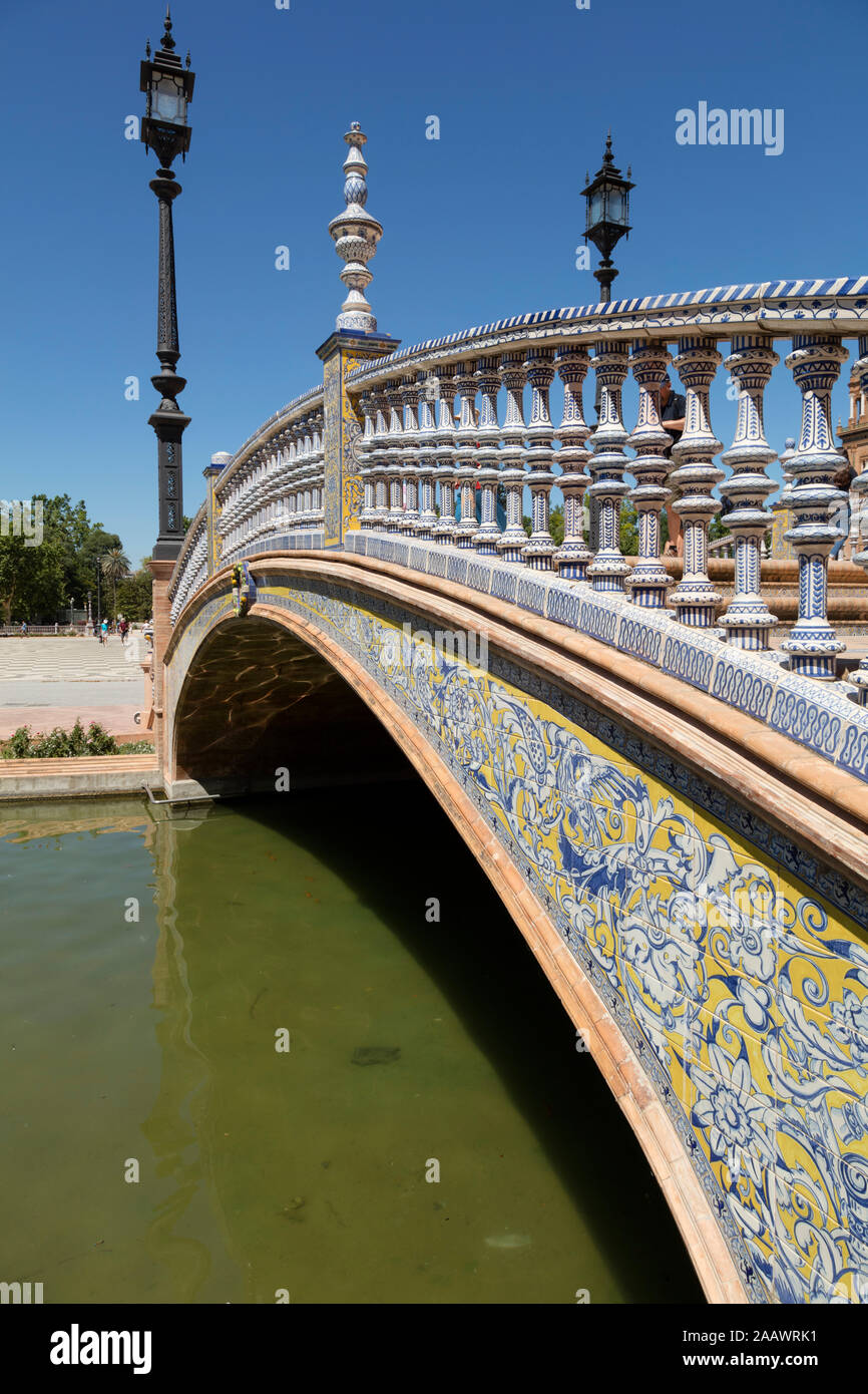 Railing and footbridge with ceramic tiles at Plaza de Espana, Andalusia, Spain Stock Photo