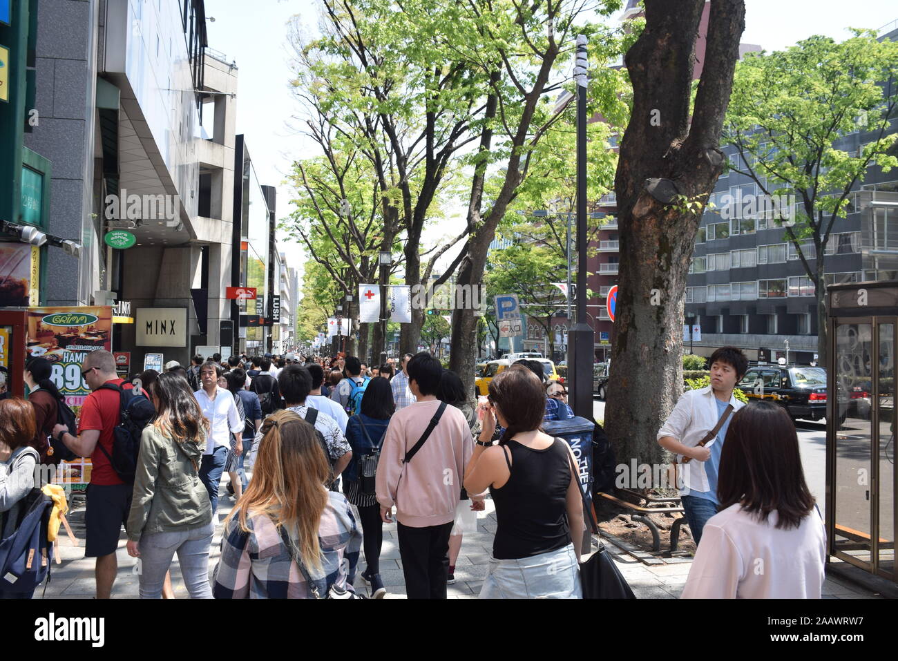 Crowd of people on the streets of Omotesando district in Tokyo, Japan Stock Photo